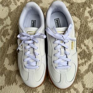 Puma White Sneakers with Gold Accents